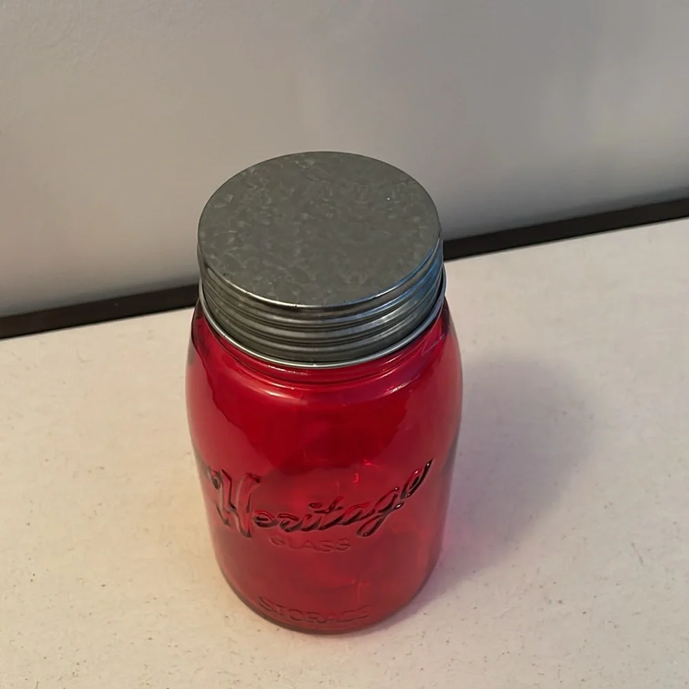 Red Decorative Jar with Lights on inside .